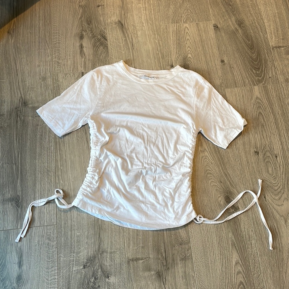 White Cotton short sleeve T-shirt with ruching drawstring sides.